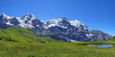 Wengernalp Eiger Moench Jungfrau Silberhorn Fine Art Nature Photography River Lake Prints - 001787 - 15-07-2007 - 9909x4380 Pixel Wengernalp Eiger Moench Jungfrau Silberhorn Fine Art Nature Photography River Lake Prints Fine Art Landscapes Grass Cloud Fine Art Foto Stock Image Sky Fine Art...