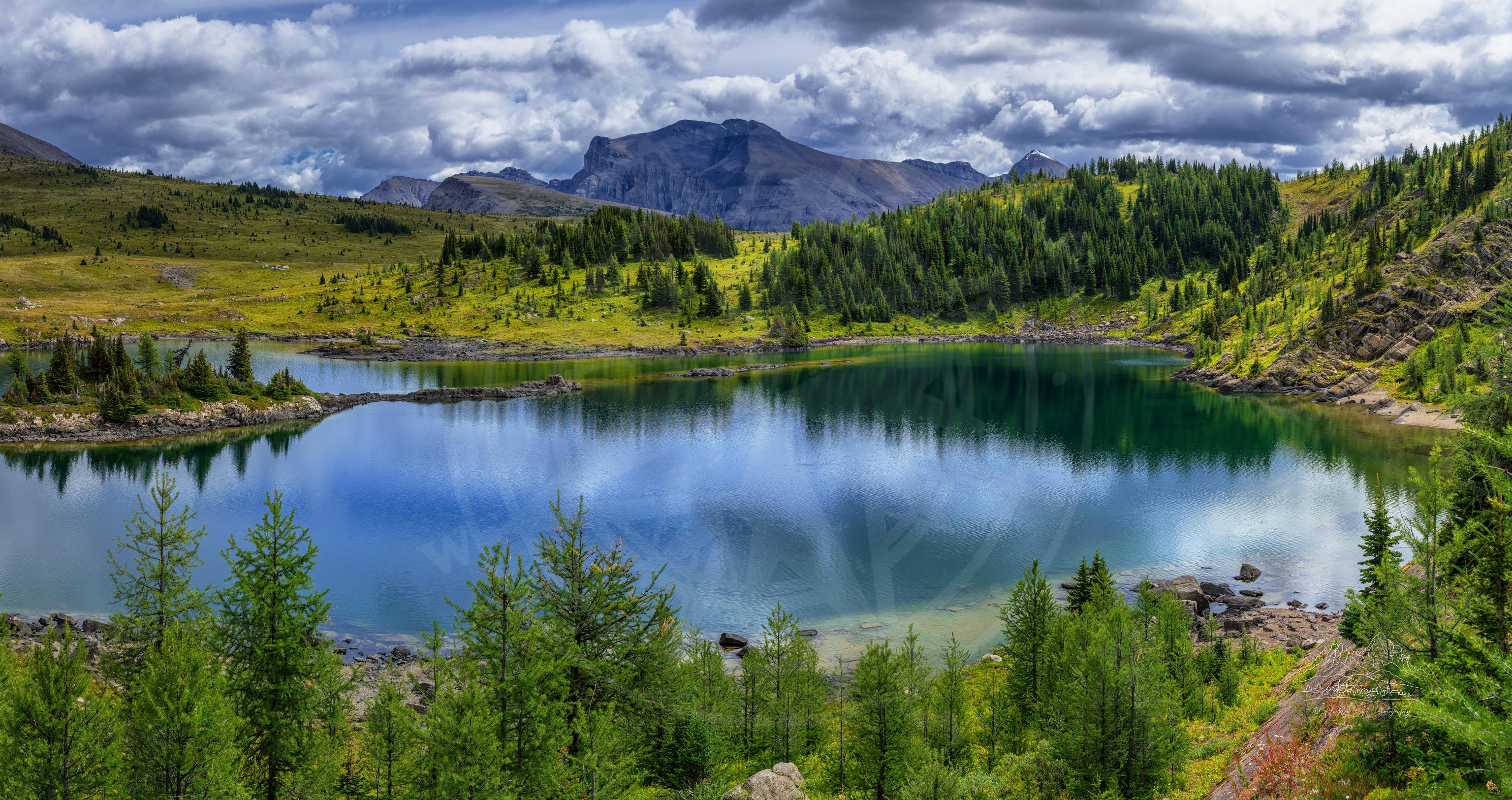 Panoramic Summer View of Rock Isle Lake and Mountains in British Columbia