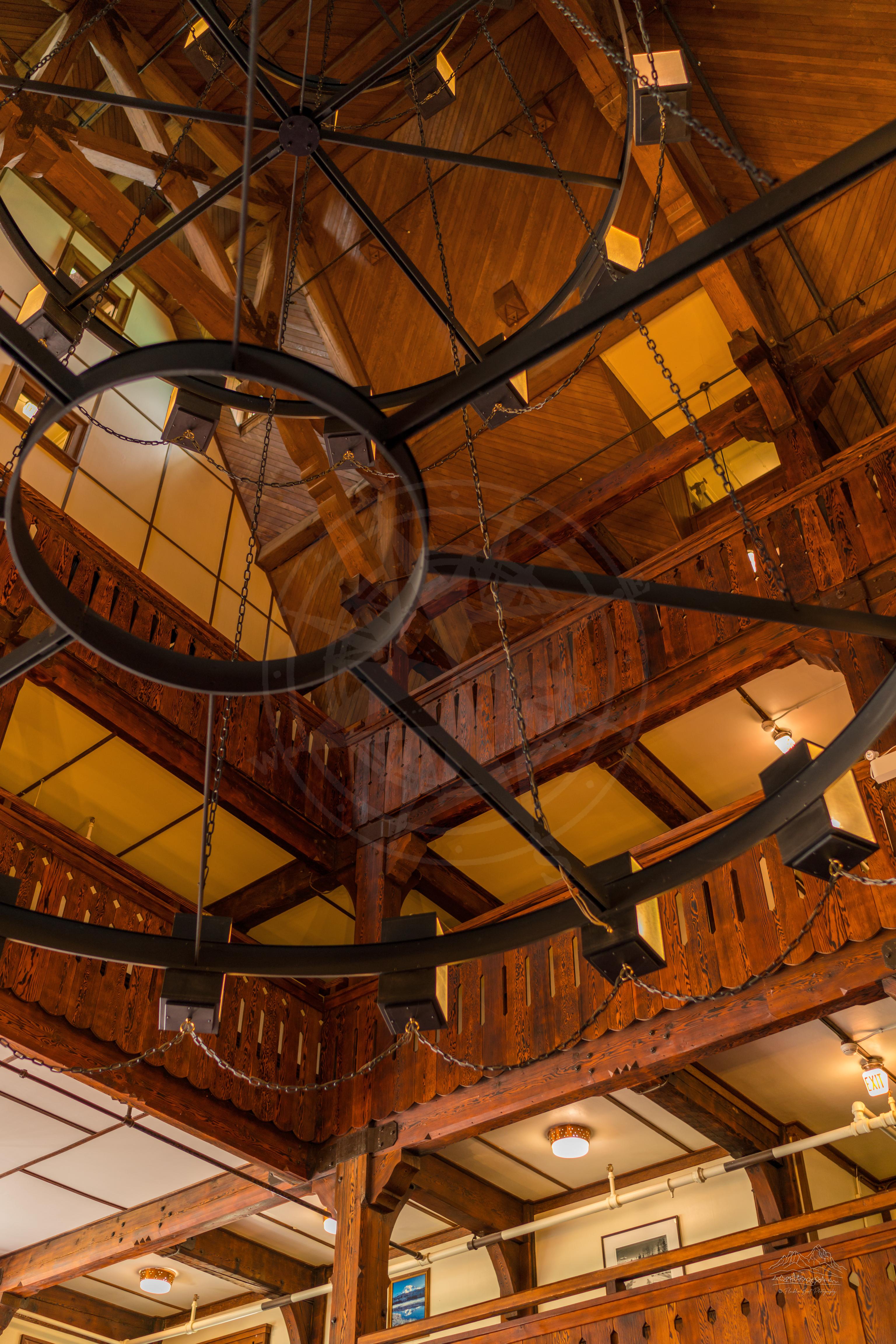 Interior view of Prince of Wales Hotel with wooden ceiling and stairs in Alberta